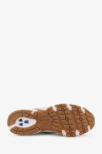 New balance men’s grey mesh sneakers with brown rubber sole white accents and blue triangular details visible from the back