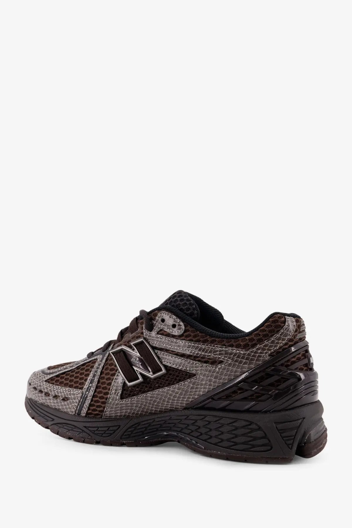 New Balance men’s mesh sneakers grey featuring dark brown and gray snake-skin texture with black accents