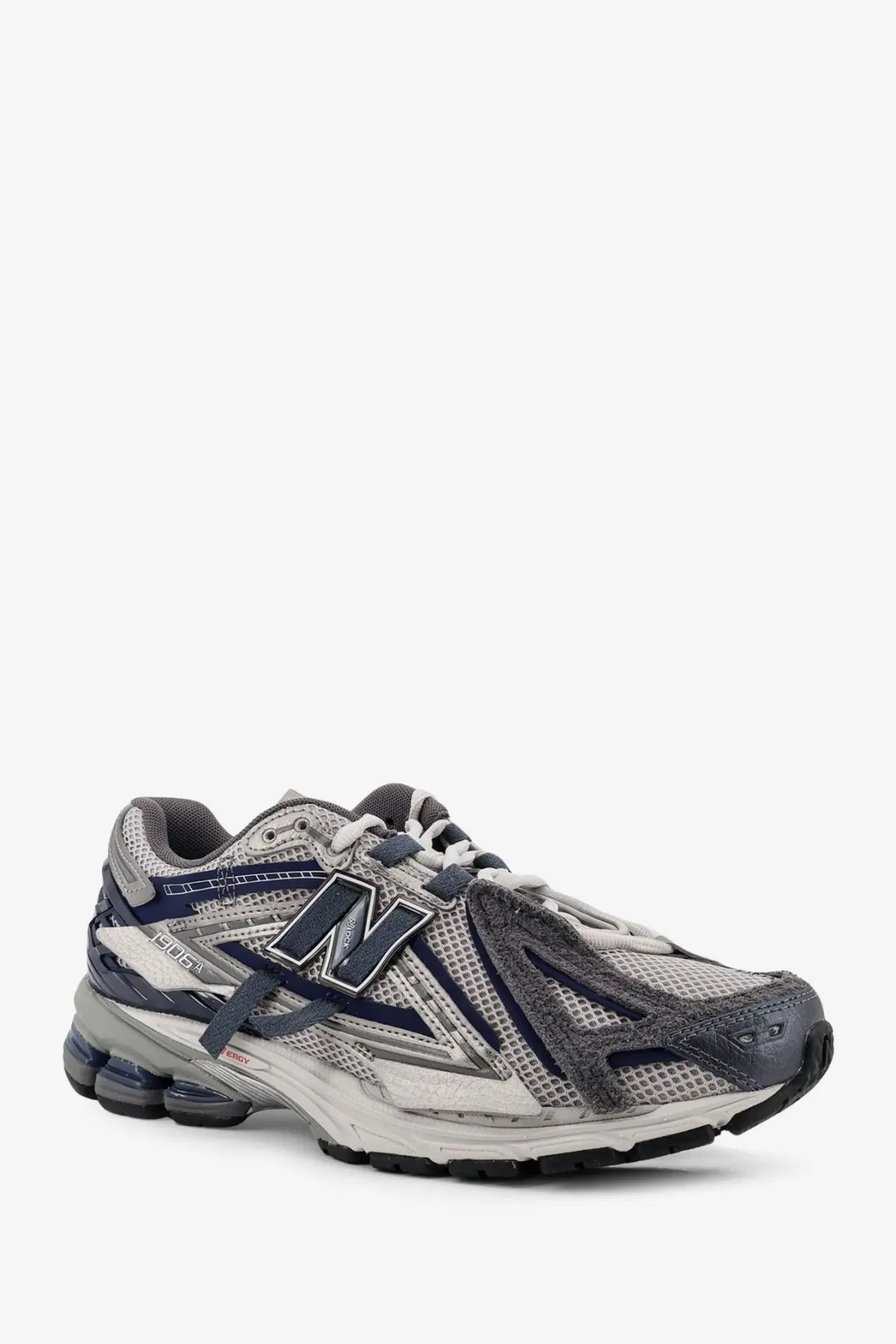 New balance men’s mesh sneakers grey in gray and navy blue with mesh upper, rubber outsole, and visible air cushioning units