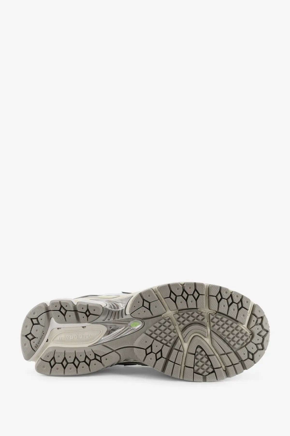 New Balance men’s mesh sneakers grey with gray rubber sole honeycomb tread and white midsole featuring logo