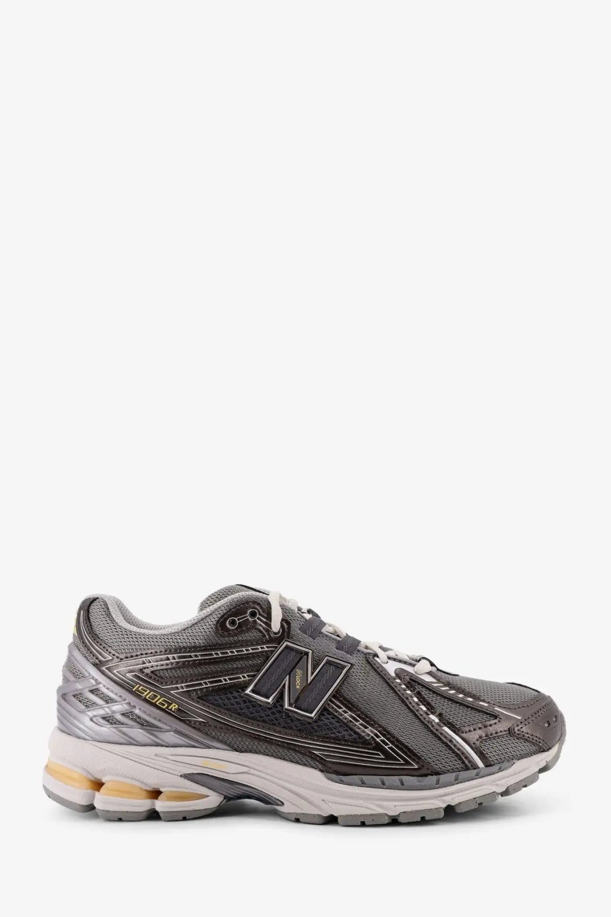New balance men’s mesh sneakers grey gray and silver 1906r running shoe with mesh upper rubber outsole and gold accents
