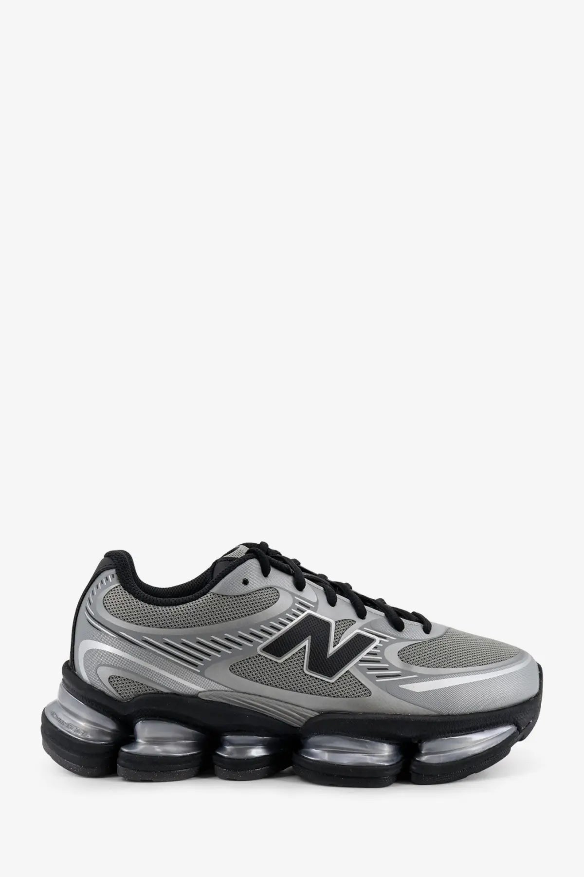 New Balance men’s mesh sneakers grey with silver and black air-cushioned sole for running and casual wear