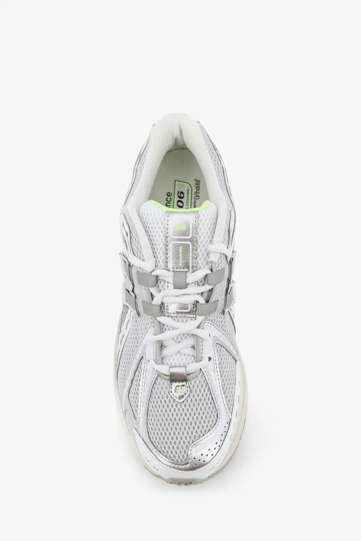 New Balance men’s mesh sneakers grey with white and silver mesh, metallic accents, and lime green interior lining