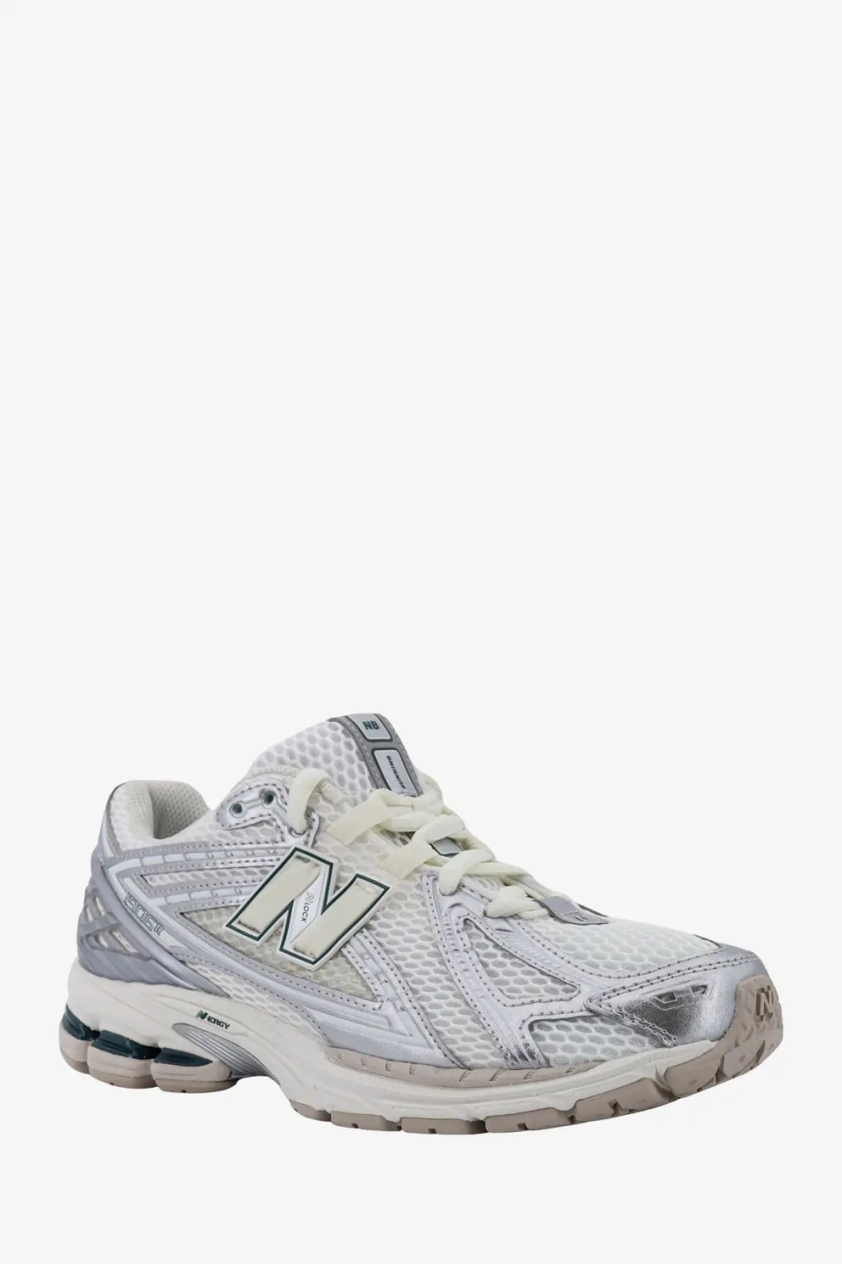 New Balance men’s mesh sneakers silver featuring white and silver running shoe with mesh upper and rubber sole