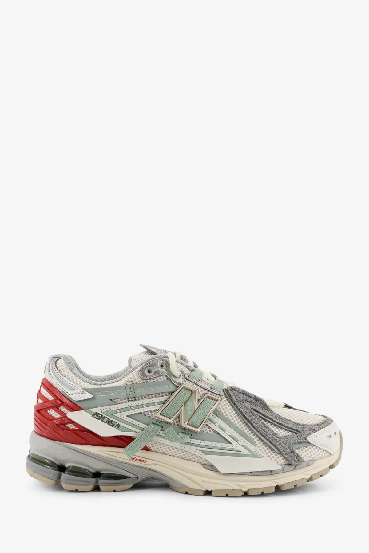 New balance men’s mesh sneakers white featuring retro design with mesh suede and synthetic overlays in white gray and red accents