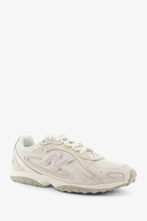 New Balance men’s beige mesh sneakers with soft pink n logo and mesh and suede upper in white style