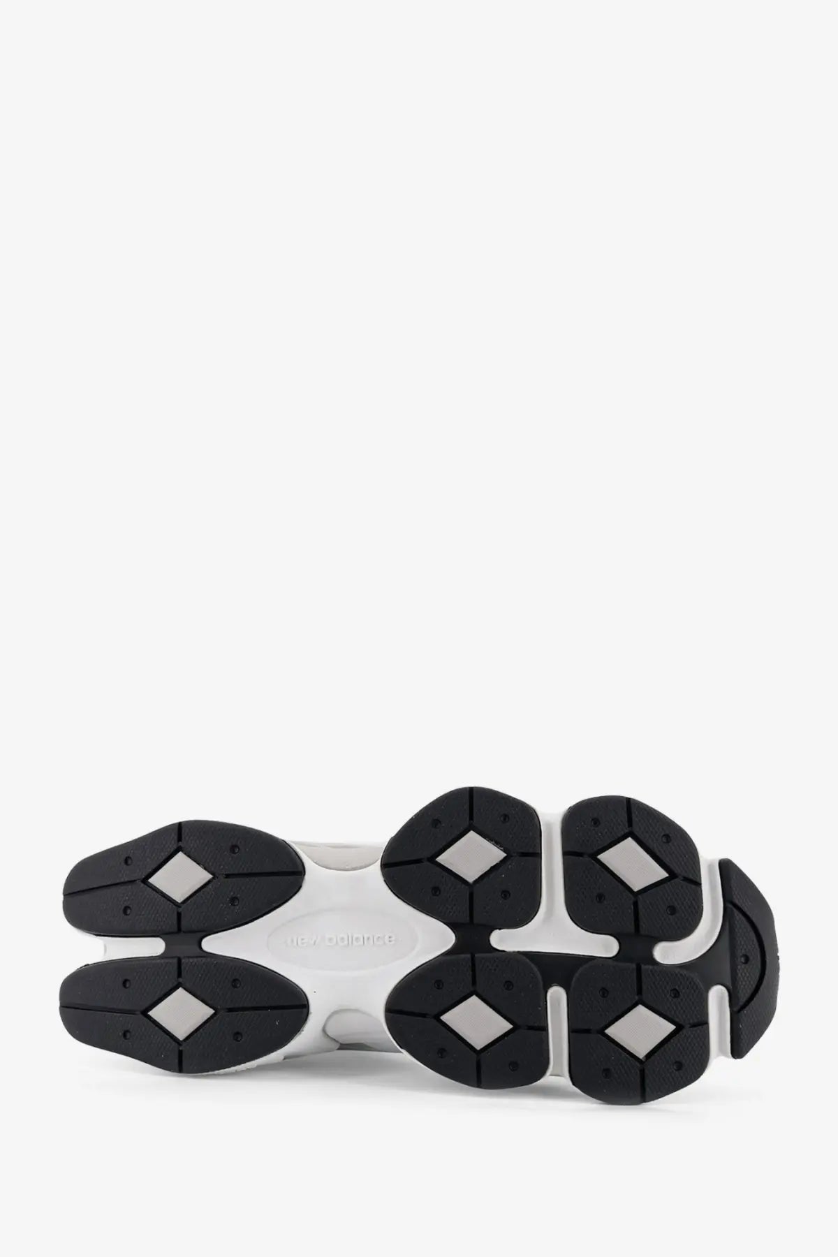 New Balance men’s mesh sneakers white with black and white chunky sole featuring diamond-shaped rubber grips