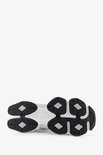 New Balance men’s mesh sneakers white with black and white chunky sole featuring diamond-shaped rubber grips