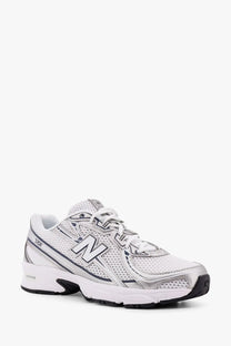 New Balance men’s mesh sneakers white with white and silver 1403 running shoe featuring mesh upper and rubber sole