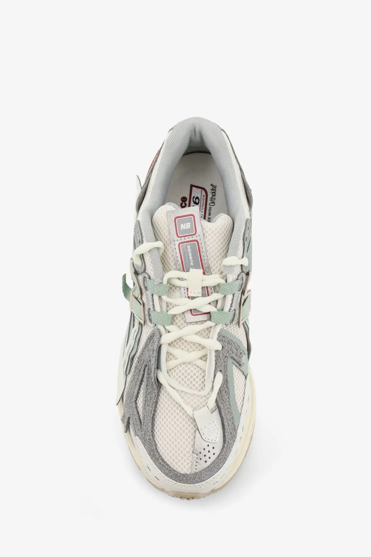 New Balance men’s mesh sneakers white with retro-inspired gray and off-white mesh and suede upper and pink accents