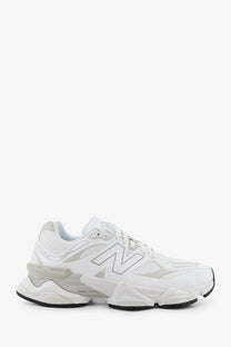 White new balance men’s mesh sneaker with chunky layered sole and breathable mesh upper for casual wear