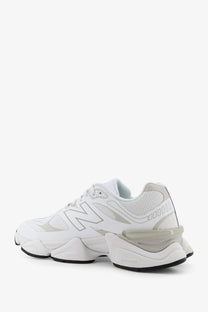 New Balance men’s mesh sneaker in white with chunky layered sole and subtle gray accents