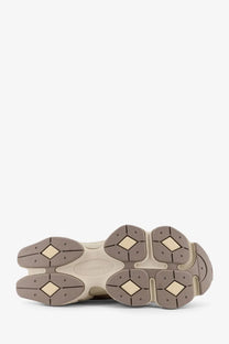 New Balance men’s mesh and suede low top sneakers in beige with chunky taupe sole and diamond tread patterns
