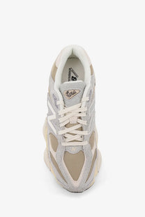 New balance men’s grey 9060 sneaker with mesh panels suede overlays and chunky white midsole