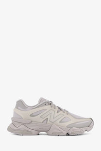 New balance men’s grey nylon sneakers with beige chunky layered sole and breathable mesh upper