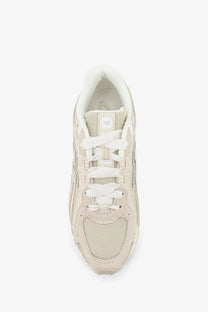 New balance men’s suede and mesh sneakers in beige with mesh and suede upper white laces and retro design