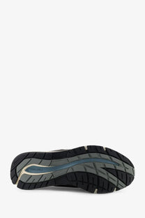 New Balance men’s suede and mesh grey sneakers with black and gray running shoe and blue accent fuelcell midsole stripe