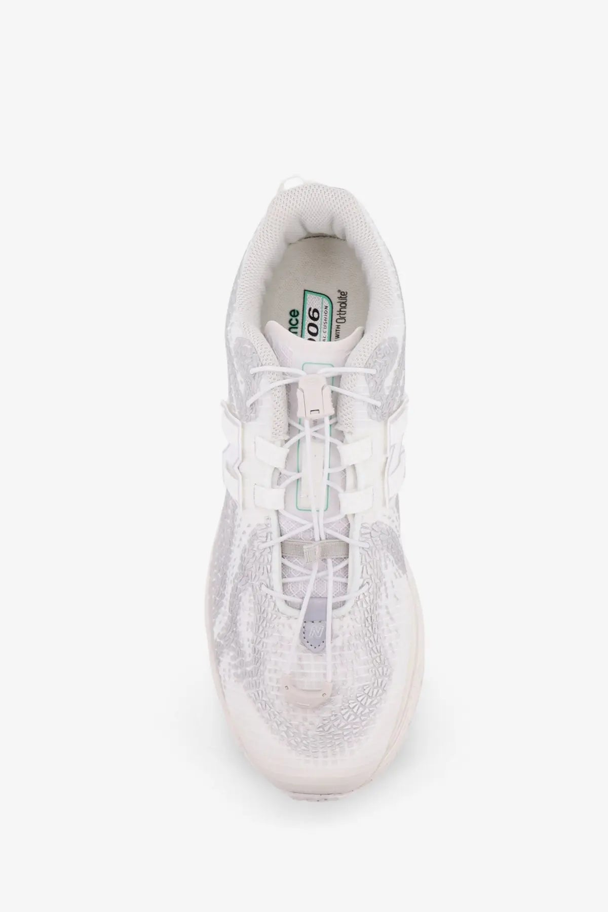 White new balance men’s technical fabric sneaker with textured semi-transparent upper and matching laces