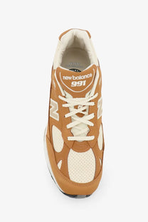 New Balance men’s tier leather sneakers beige with tan and cream perforated leather panels and white laces
