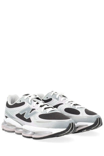 New balance unisex abzorb sneaker in grey with silver and black accents and a translucent air-cushioned sole