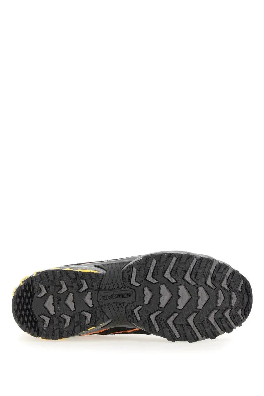 Black and gray rubber outsole with rugged tread and New Balance logo on new balance unisex sneaker 610v1 yellow
