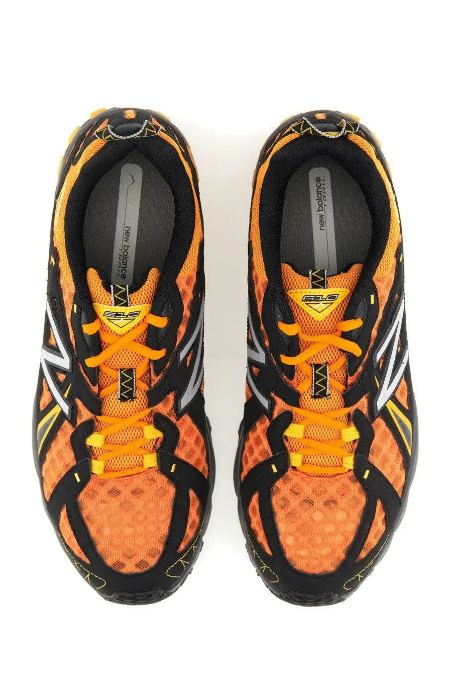 New balance unisex sneaker 610v1 yellow in orange and black with bright yellow laces designed for running