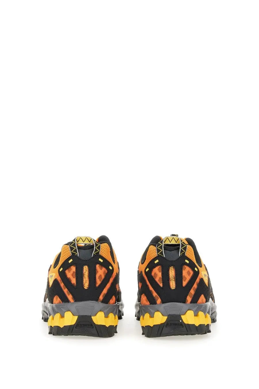 New balance unisex sneaker 610v1 yellow vibrant orange and black trail running shoes with rugged textured sole design