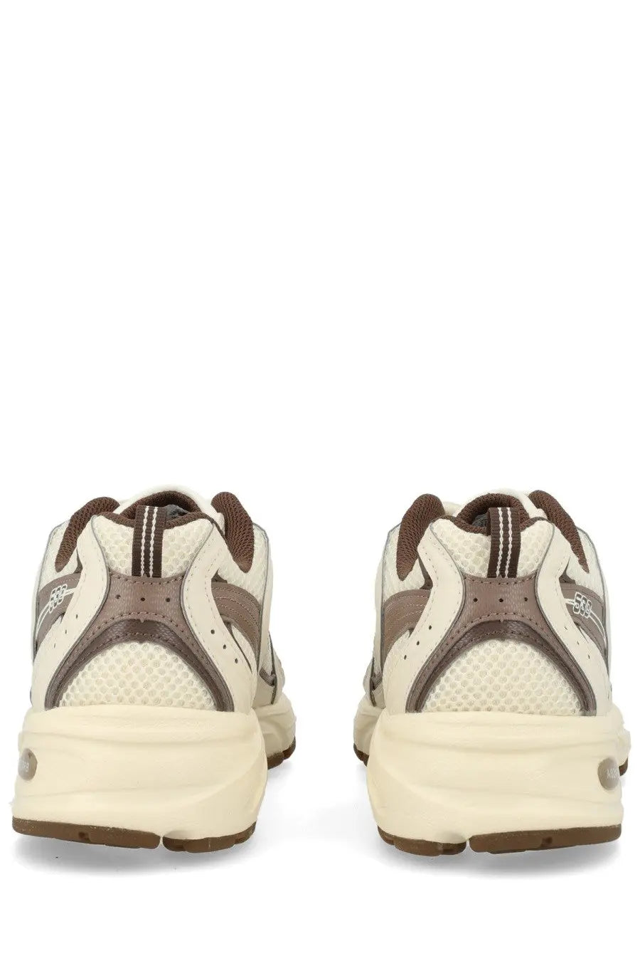 New Balance unisex sneaker beige cream and brown athletic shoe with mesh synthetic overlays and chunky midsole