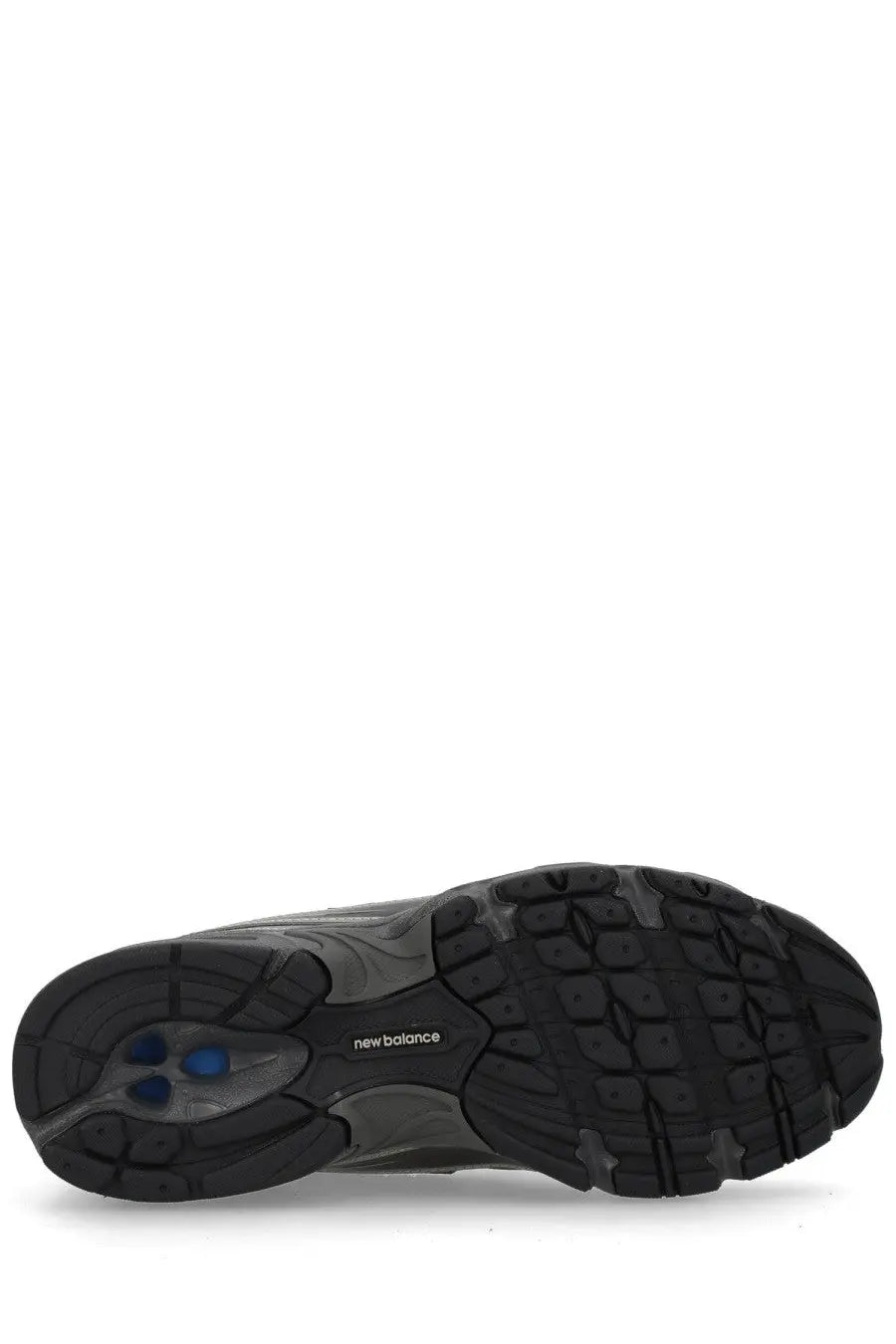 New balance unisex sneaker black with textured rubber sole and blue accent details visible on the side