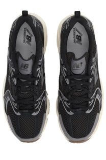 New balance unisex sneaker black with black and gray mesh upper suede accents and white midsole running shoe