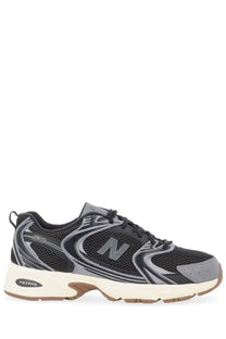 New Balance unisex sneaker black featuring black and gray mesh upper with white midsole and rubber sole