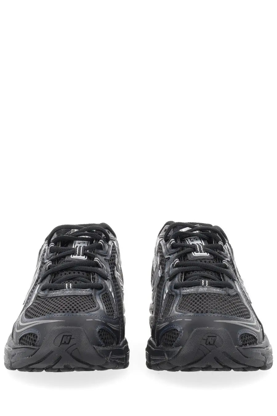 New balance unisex sneaker black featuring black mesh and rubber with a sleek modern athletic design