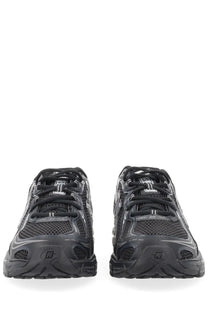New balance unisex sneaker black featuring black mesh and rubber with a sleek modern athletic design