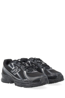 New Balance unisex sneaker black with silver accents and breathable mesh upper for running and everyday wear