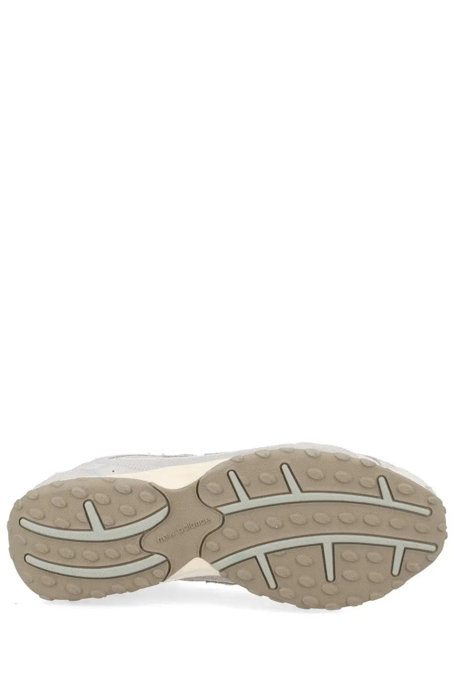 New balance unisex grey sneaker with beige rubber sole white midsole and new balance branding on the back side