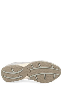 New balance unisex grey sneaker with beige rubber sole white midsole and new balance branding on the back side