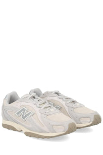 New Balance unisex sneaker grey with light gray and beige suede and mesh upper featuring matching n logo