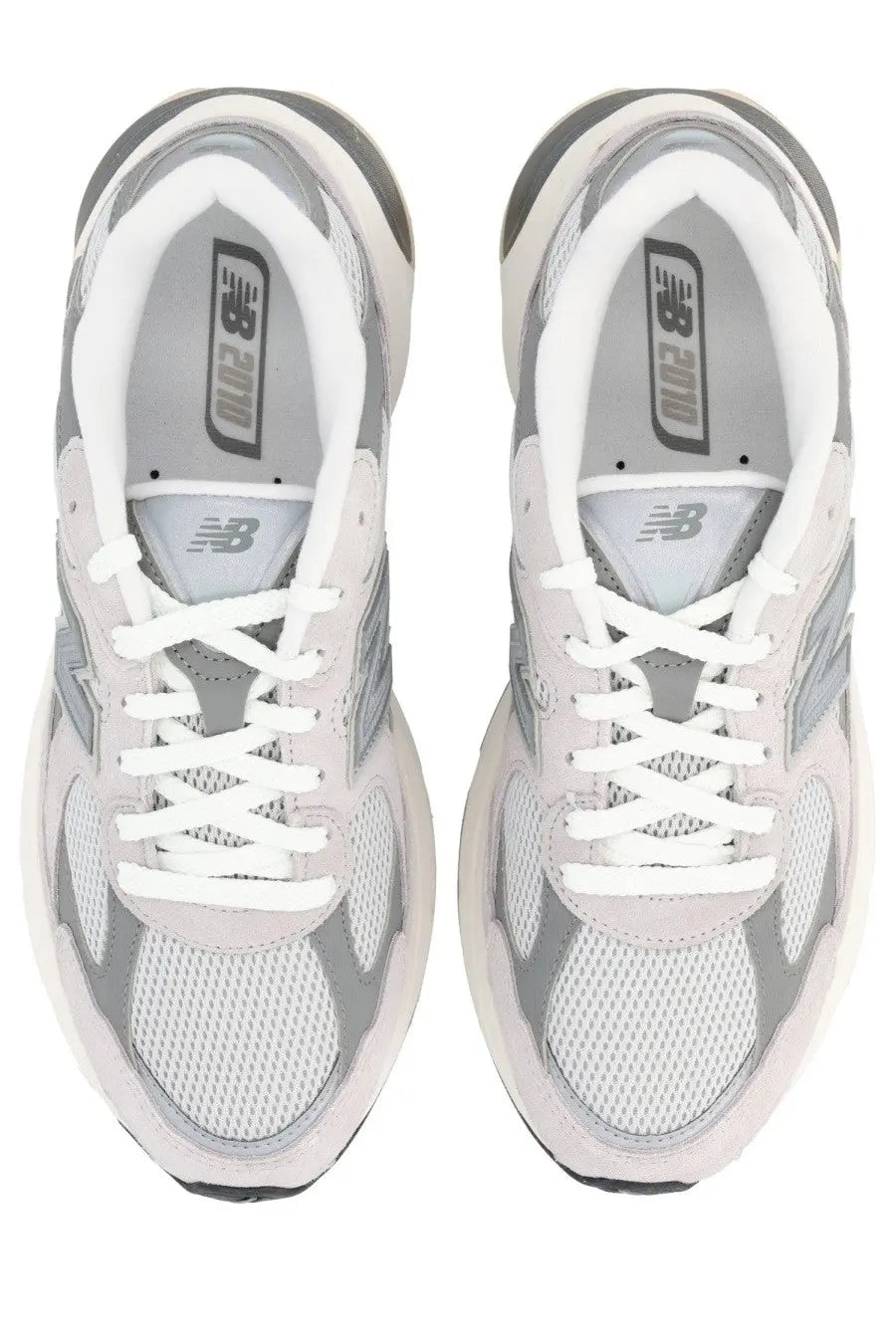 New Balance unisex sneaker grey with silver and white mesh uppers and rubber soles for comfortable wear