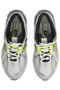 New balance unisex sneaker u1906r grey with white and neon yellow mesh upper and black accents running shoes