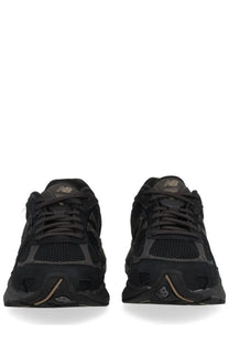 New Balance unisex sneaker U2010 black with mesh and synthetic overlays and subtle gold accents on heel tab and midsole