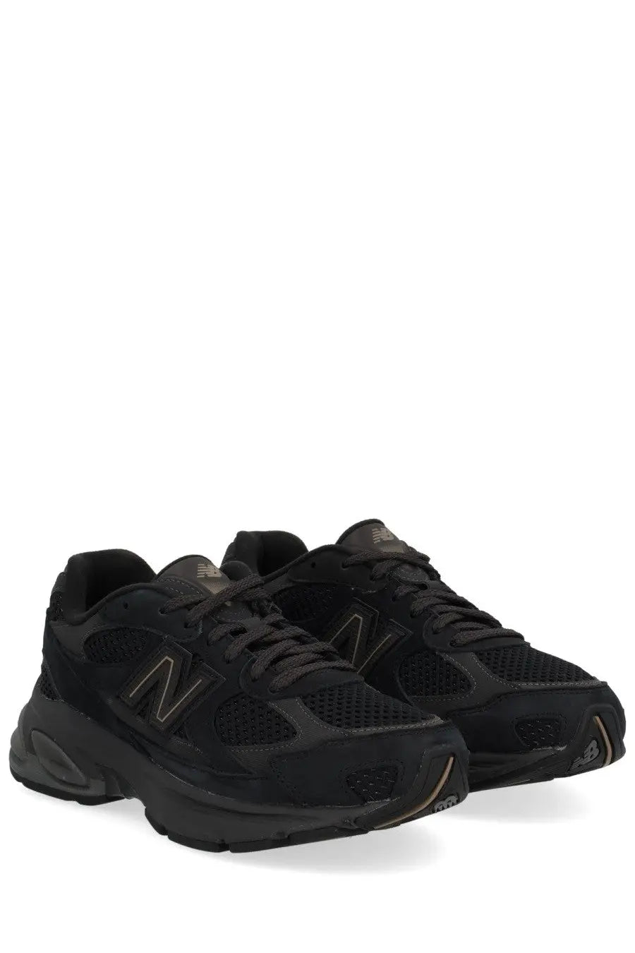 New Balance unisex sneaker U2010 black featuring mesh and suede upper with subtle metallic logo accents