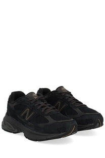 New Balance unisex sneaker U2010 black featuring mesh and suede upper with subtle metallic logo accents