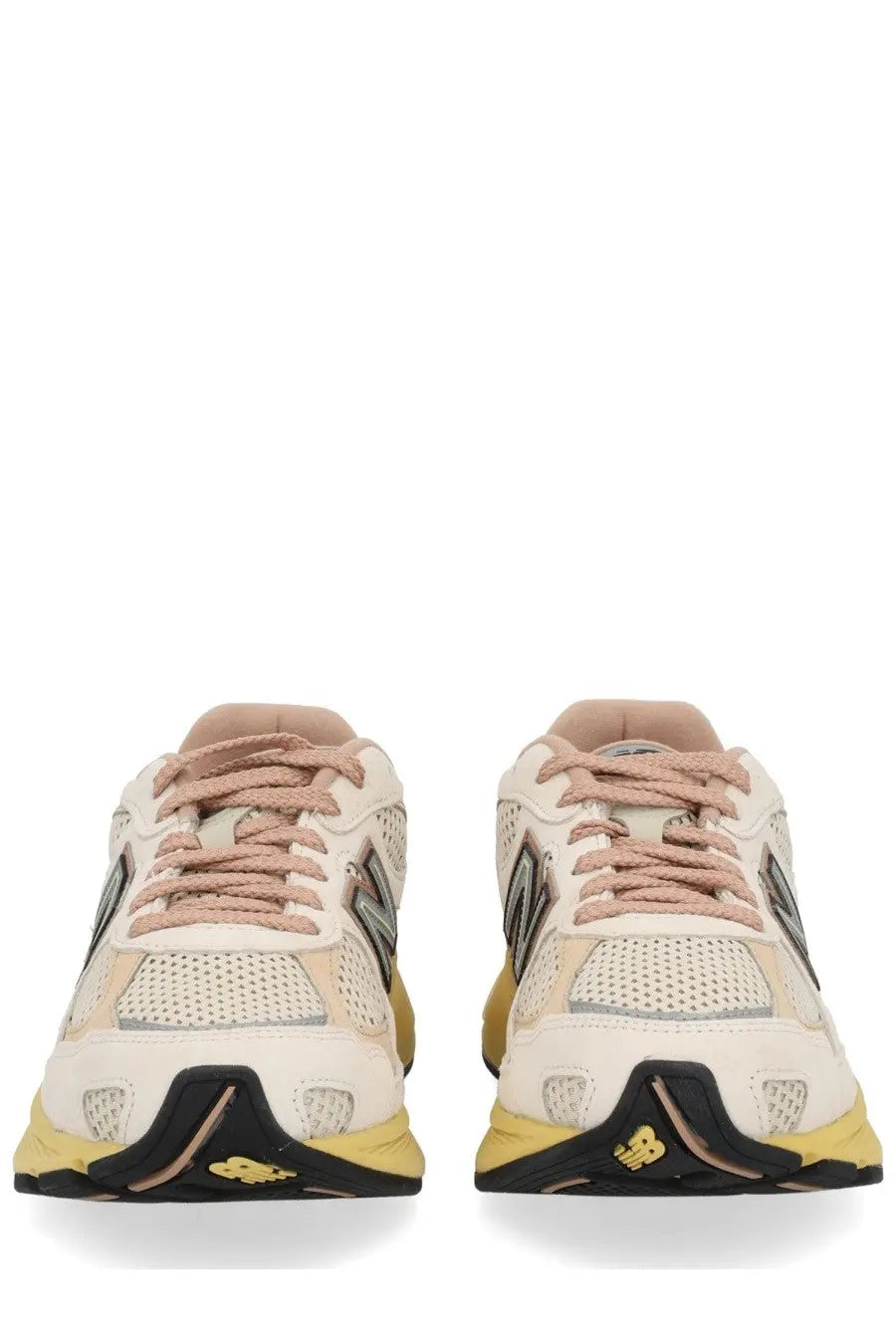 New Balance unisex sneaker U2010 multicolor featuring cream and yellow mesh uppers with black accents