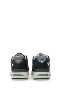 New Balance unisex sneaker U991 blue in dark navy suede with gray mesh and teal translucent heel air unit