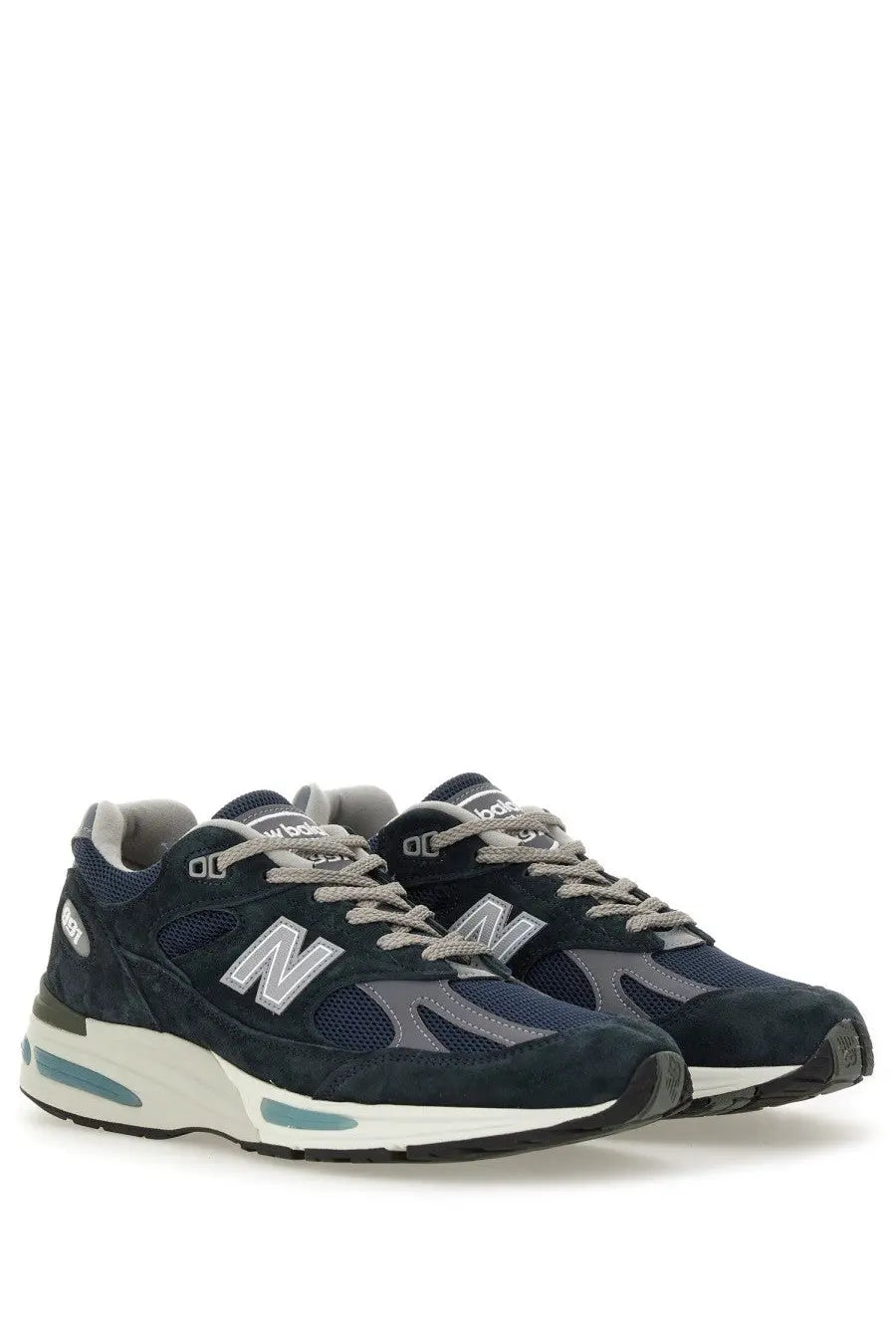New Balance unisex sneaker U991 blue navy suede and mesh with gray laces silver logo and teal midsole details
