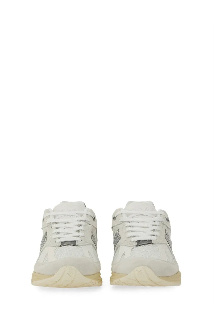 New Balance unisex sneaker U991 in white with silver accents and cream-colored sole for casual wear