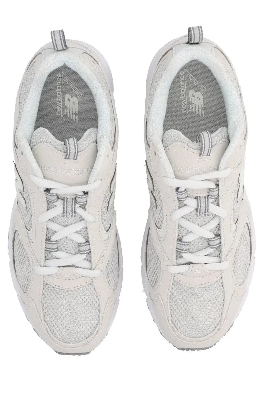 New balance unisex sneaker white featuring white 990v4 mesh and synthetic overlays with a classic retro design