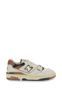 Cream-colored new balance 550 sneaker with brown and black accents featuring a classic retro design for unisex use