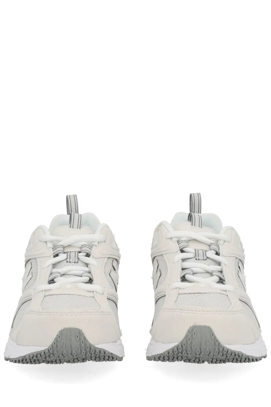 New Balance unisex sneaker white with white and gray mesh panels and rubber soles in a sleek modern design