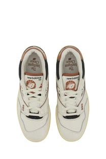 New balance unisex sneaker white leather 550 with black and tan accents for casual wear